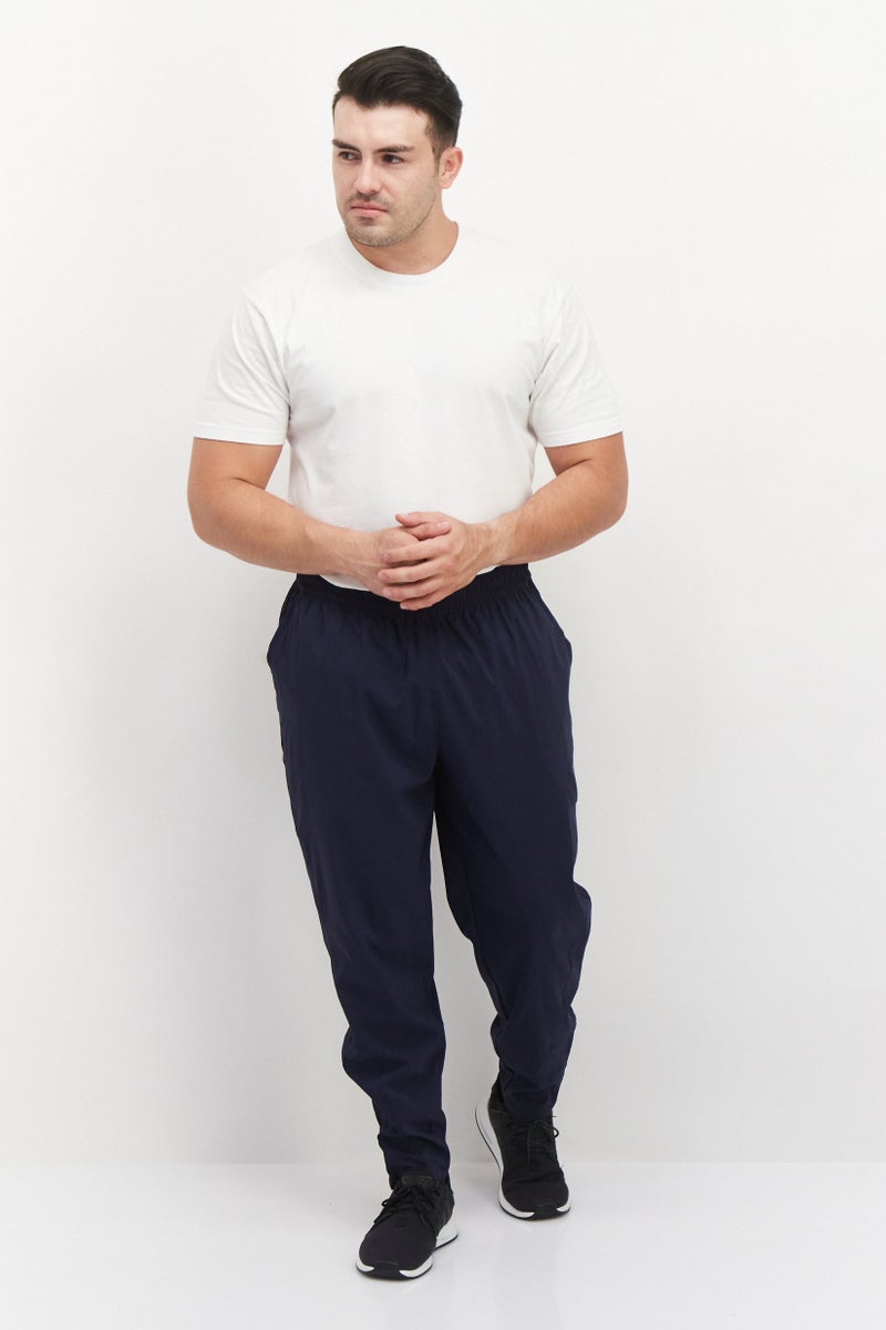 PUMA سروال رياضي للرجال برباط خصر بشعار العلامة التجارية، أزرق داكن - Image 2